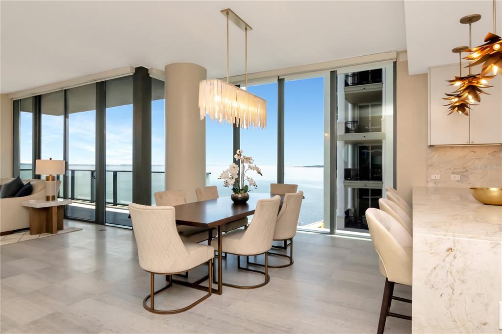 2912 West Santiago Street, Unit 804 Tampa, FL 33629 - Photo 35 of 95 a dining room with furniture and window