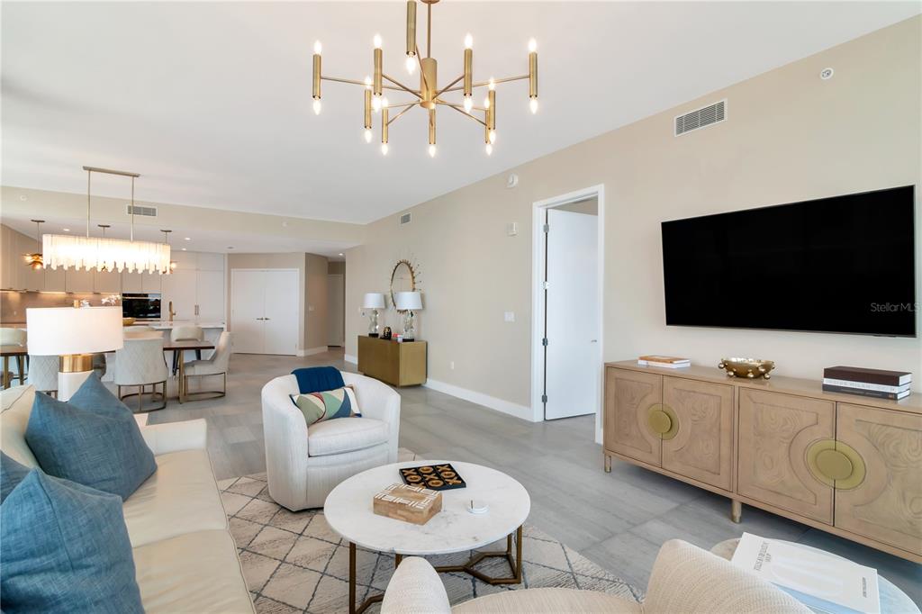 2912 West Santiago Street, Unit 804 Tampa, FL 33629 - Photo 43 of 95 a living room with furniture and a flat screen tv