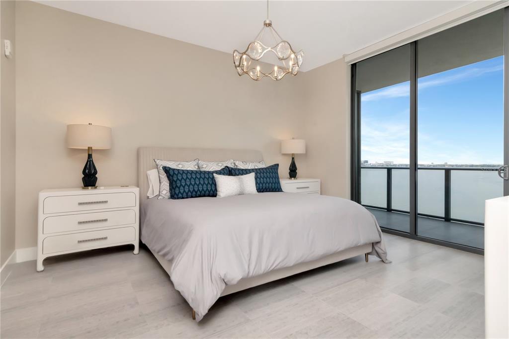 2912 West Santiago Street, Unit 804 Tampa, FL 33629 - Photo 5 of 95 a bed room with a bed and a chandelier