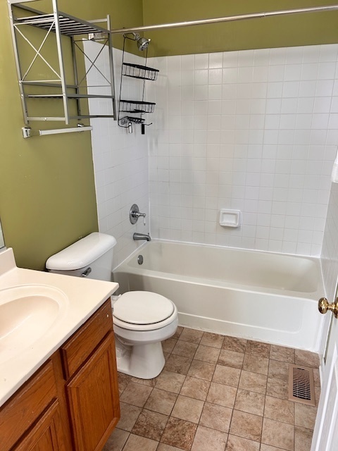 711 Violet Circle Naperville, IL 60540 - Photo 11 of 21 a bathroom with a sink a toilet and bathtub