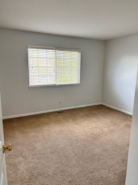 711 Violet Circle Naperville, IL 60540 - Photo 13 of 21 an empty room with a window