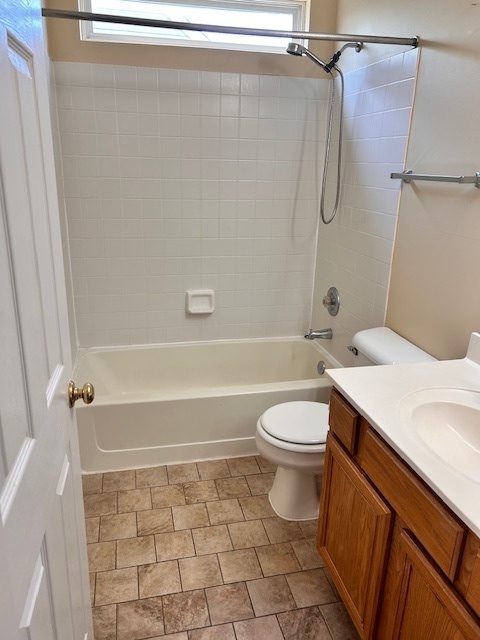 711 Violet Circle Naperville, IL 60540 - Photo 14 of 21 a bathroom with a sink a toilet and shower