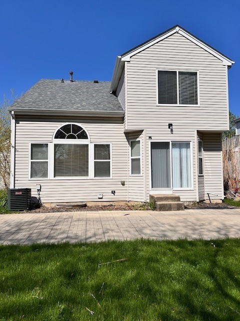 711 Violet Circle Naperville, IL 60540 - Photo 21 of 21 a front view of a house with a yard