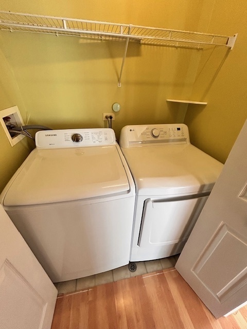 711 Violet Circle Naperville, IL 60540 - Photo 8 of 21 a utility room with a washer and dryer