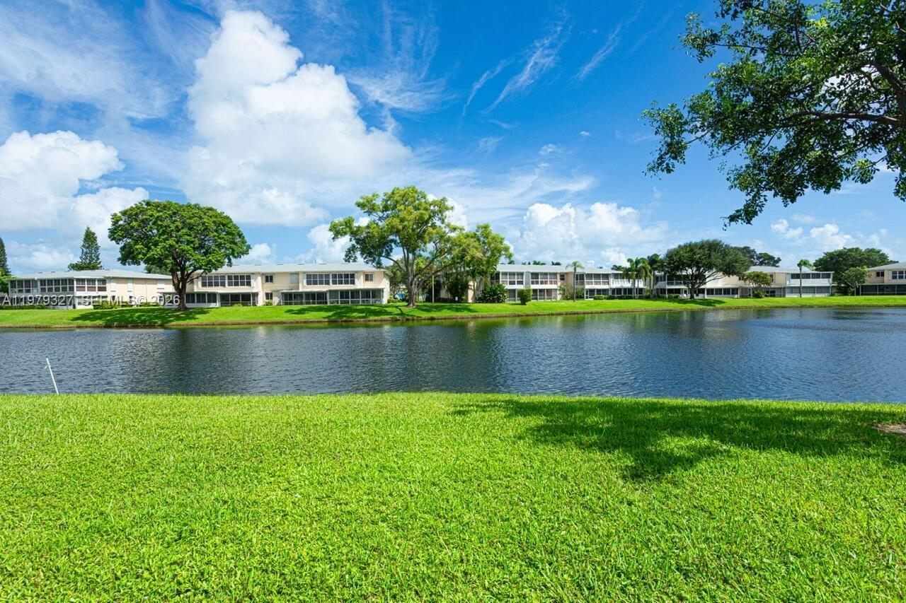 1421 Northwest 19th Terrace, Unit 102 Delray Beach, FL 33445 - Photo 24 of 30 a view of lake