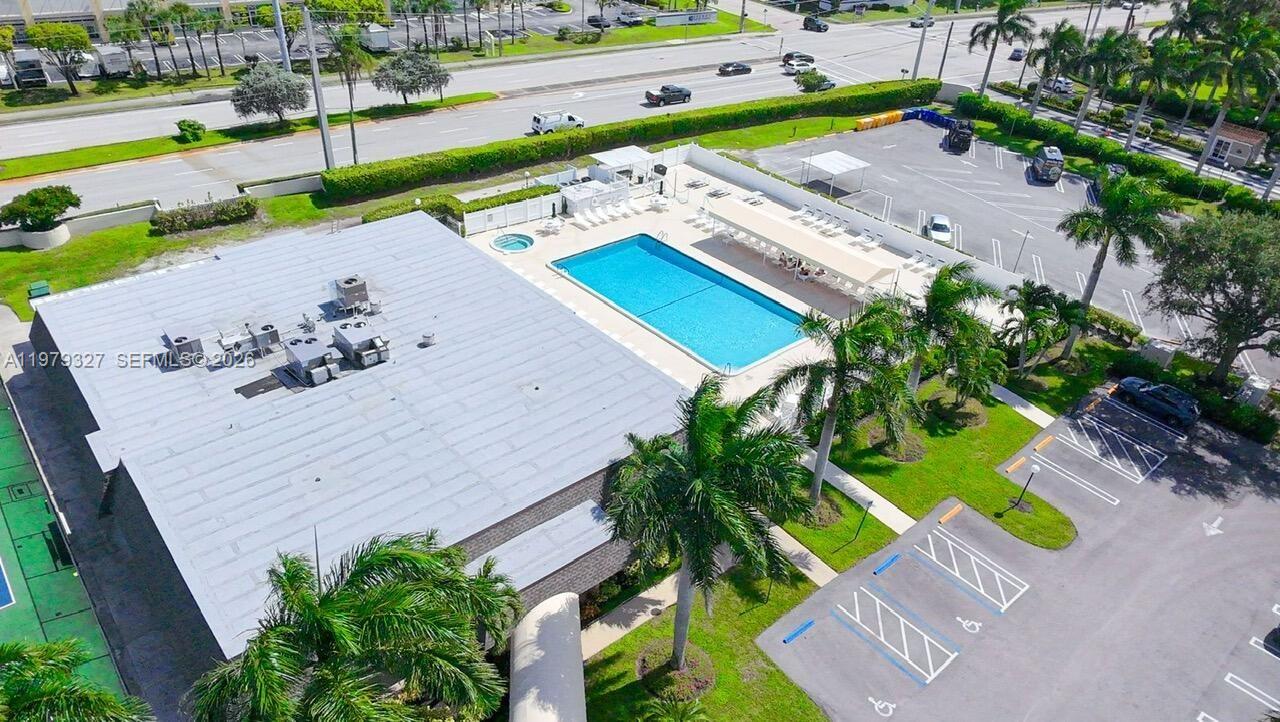 1421 Northwest 19th Terrace, Unit 102 Delray Beach, FL 33445 - Photo 27 of 30 an aerial view of a house with a garden