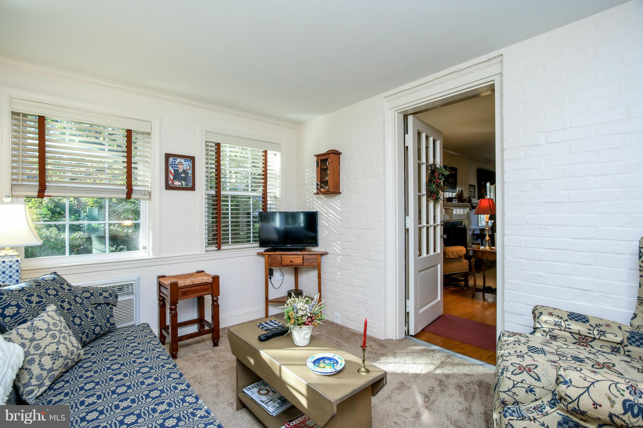 503 Worcester Road Towson, MD 21286 - Photo 5 of 18 a living room with furniture and a window