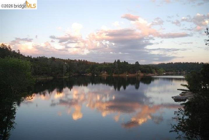 19691 Ferretti Road Groveland, CA 95321 - Photo 28 of 42 a view of lake with green space