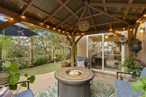 a view of a chairs and table in a patio