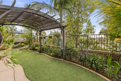 a view of yard with patio