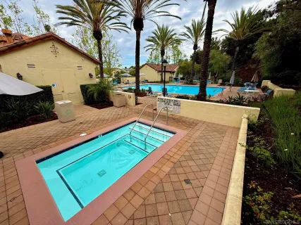 a view of a house with backyard and a slide