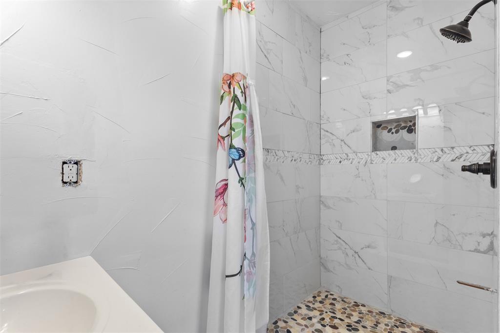 3300 Jordan Valley Road Dallas, TX 75253 - Photo 16 of 25 a bathroom with a shower