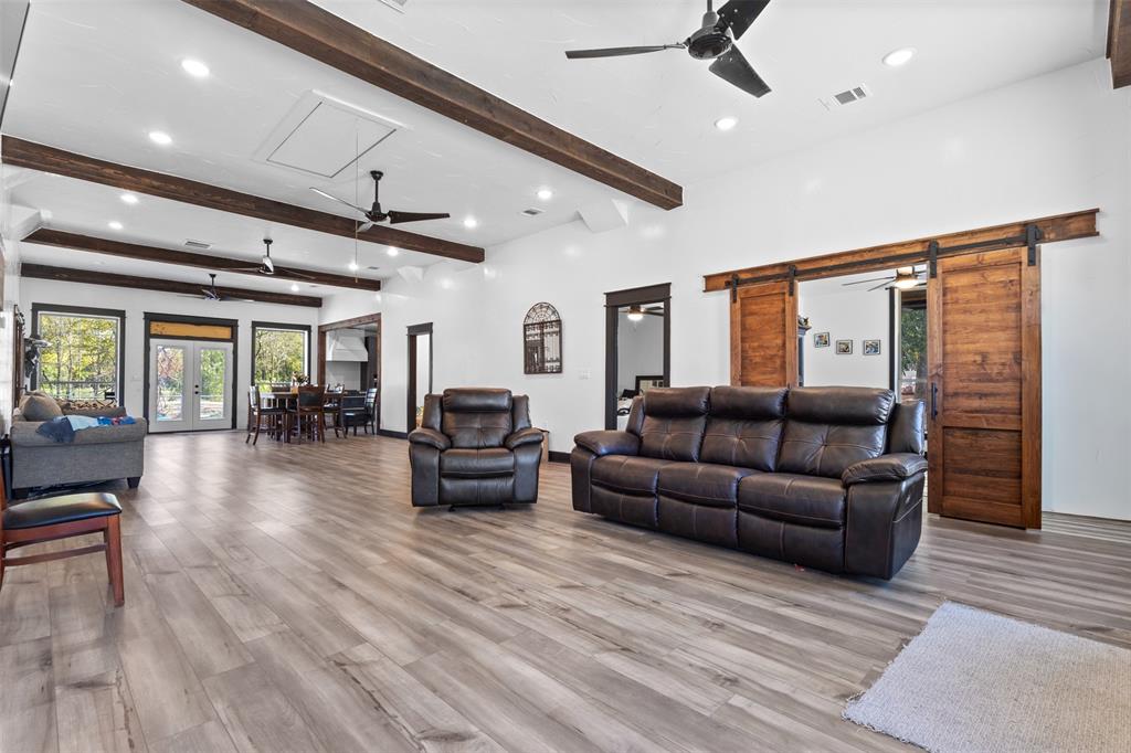 3300 Jordan Valley Road Dallas, TX 75253 - Photo 6 of 25 a living room with furniture and a wooden floor