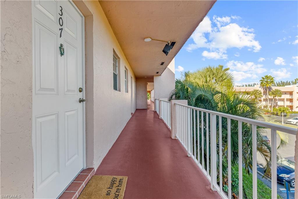 150 Turtle Lake Court, Unit 307 Naples, FL 34105 - Photo 12 of 27 a view of a balcony