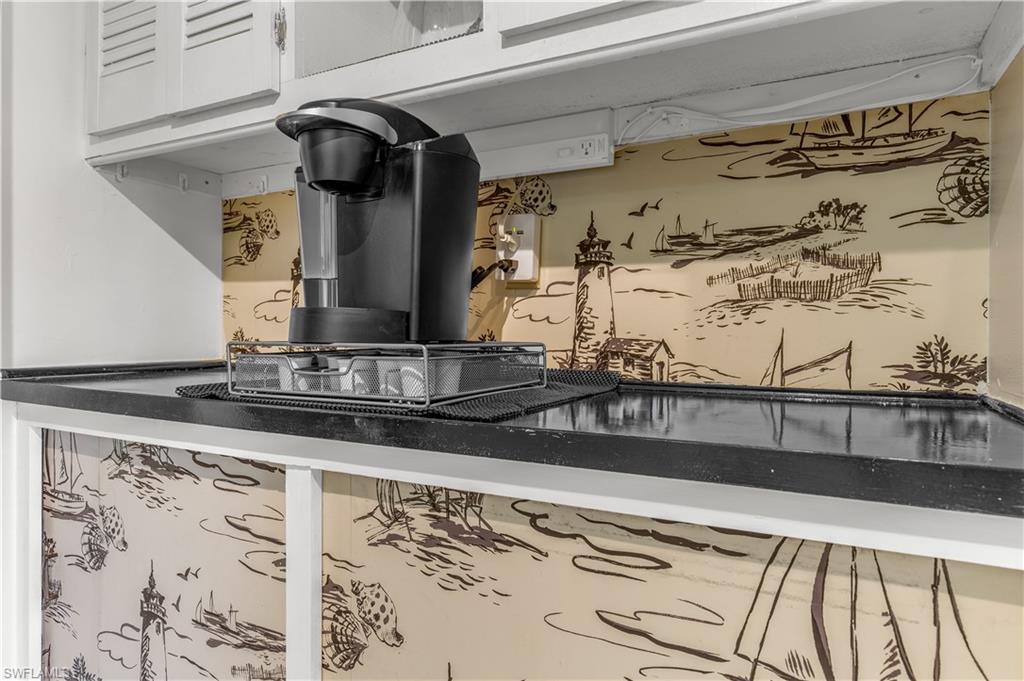 150 Turtle Lake Court, Unit 307 Naples, FL 34105 - Photo 3 of 27 a view of a closet area