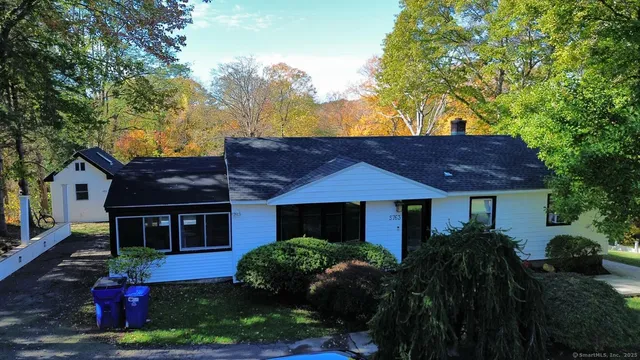 a view of a house with a garden