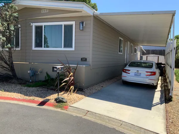 a car parked in front of a house