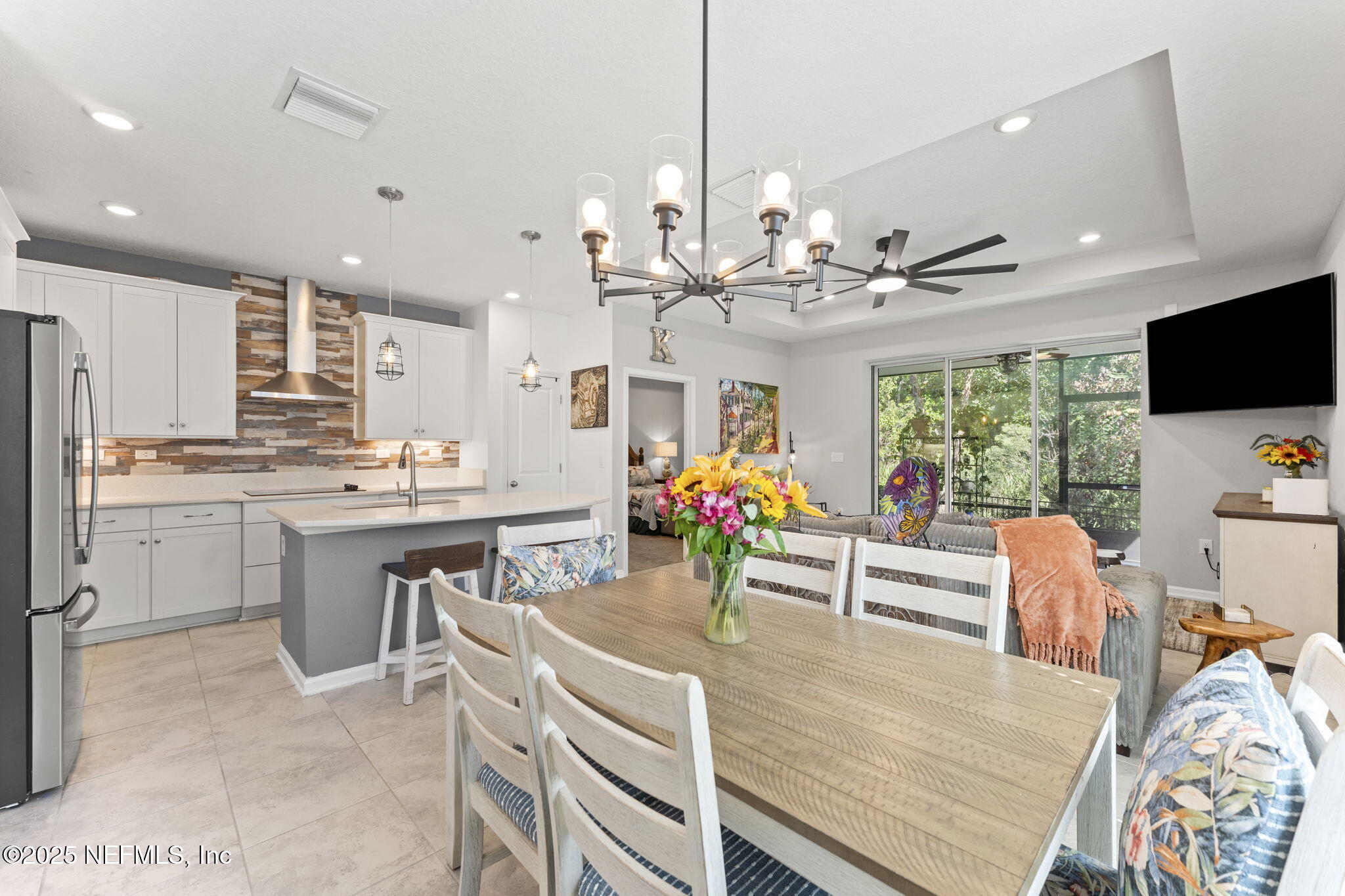 128 Modesto Drive St. Augustine, FL 32086 - Photo 12 of 30 a large kitchen with a table and chairs