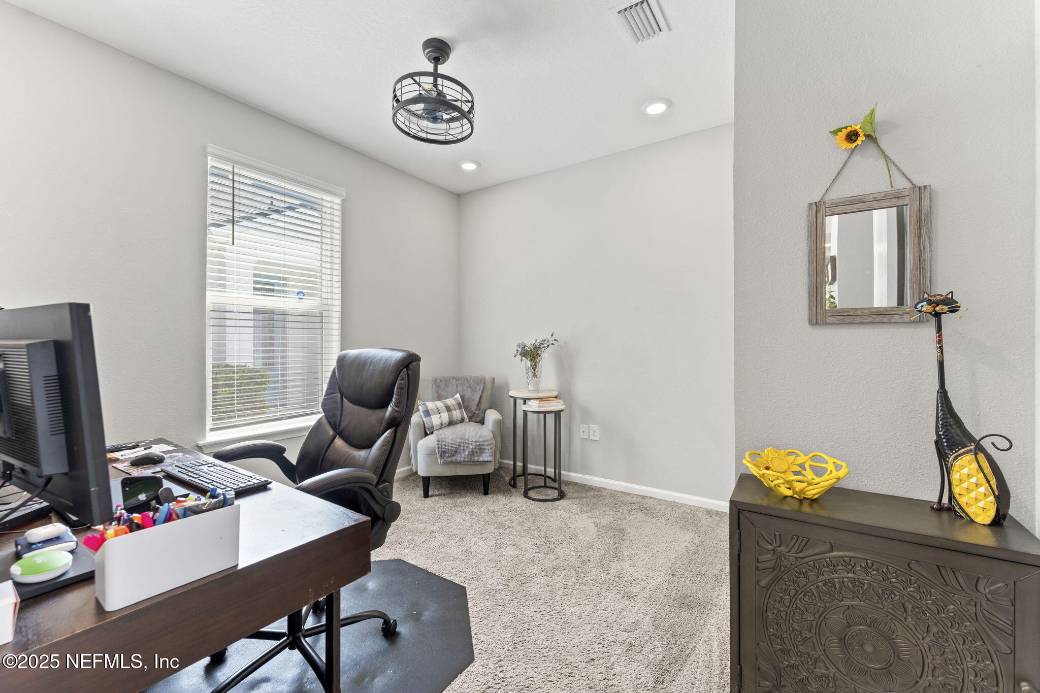 128 Modesto Drive St. Augustine, FL 32086 - Photo 20 of 30 a view of a workspace with furniture