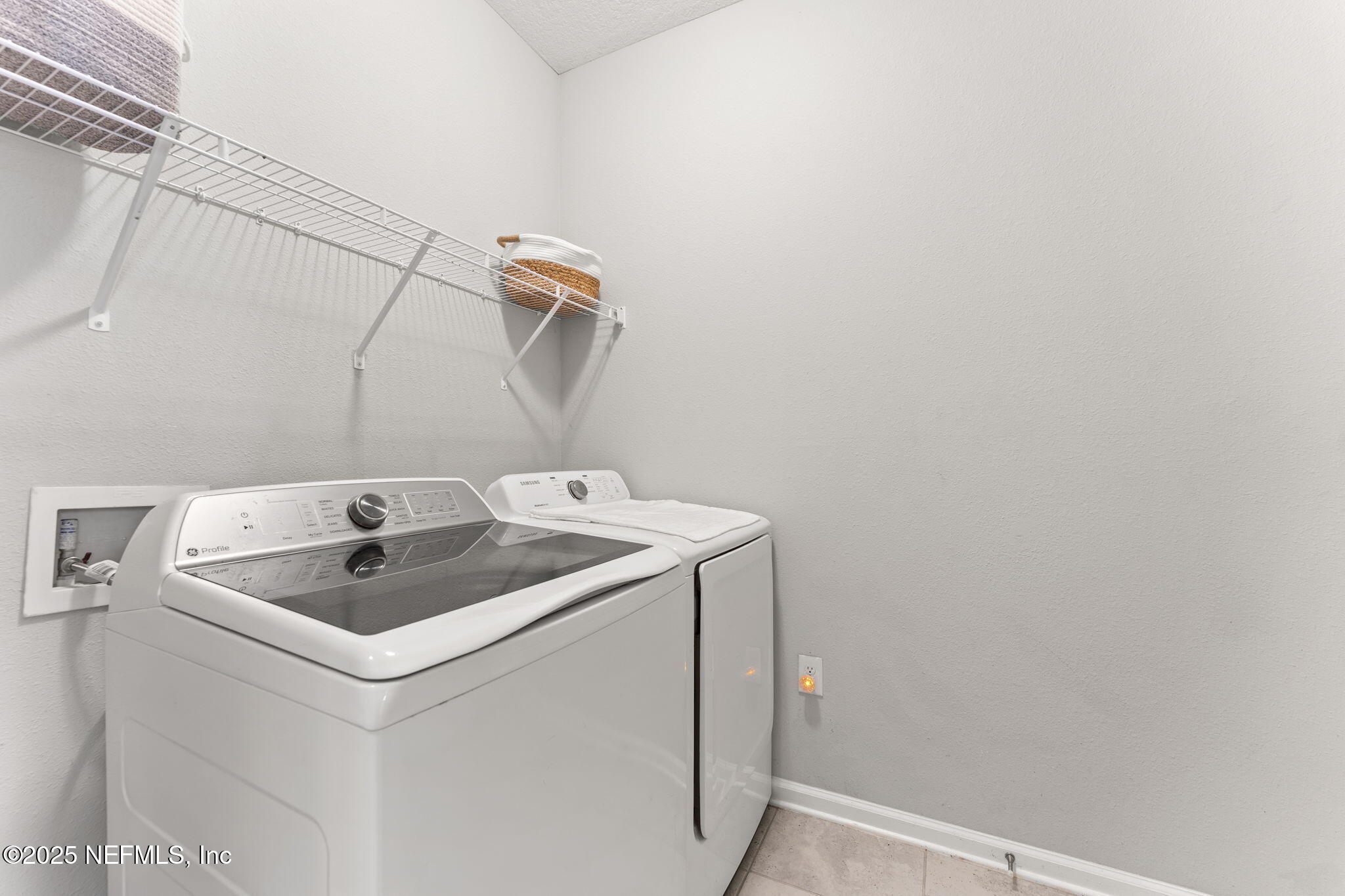 128 Modesto Drive St. Augustine, FL 32086 - Photo 25 of 30 a utility room with dryer and washer