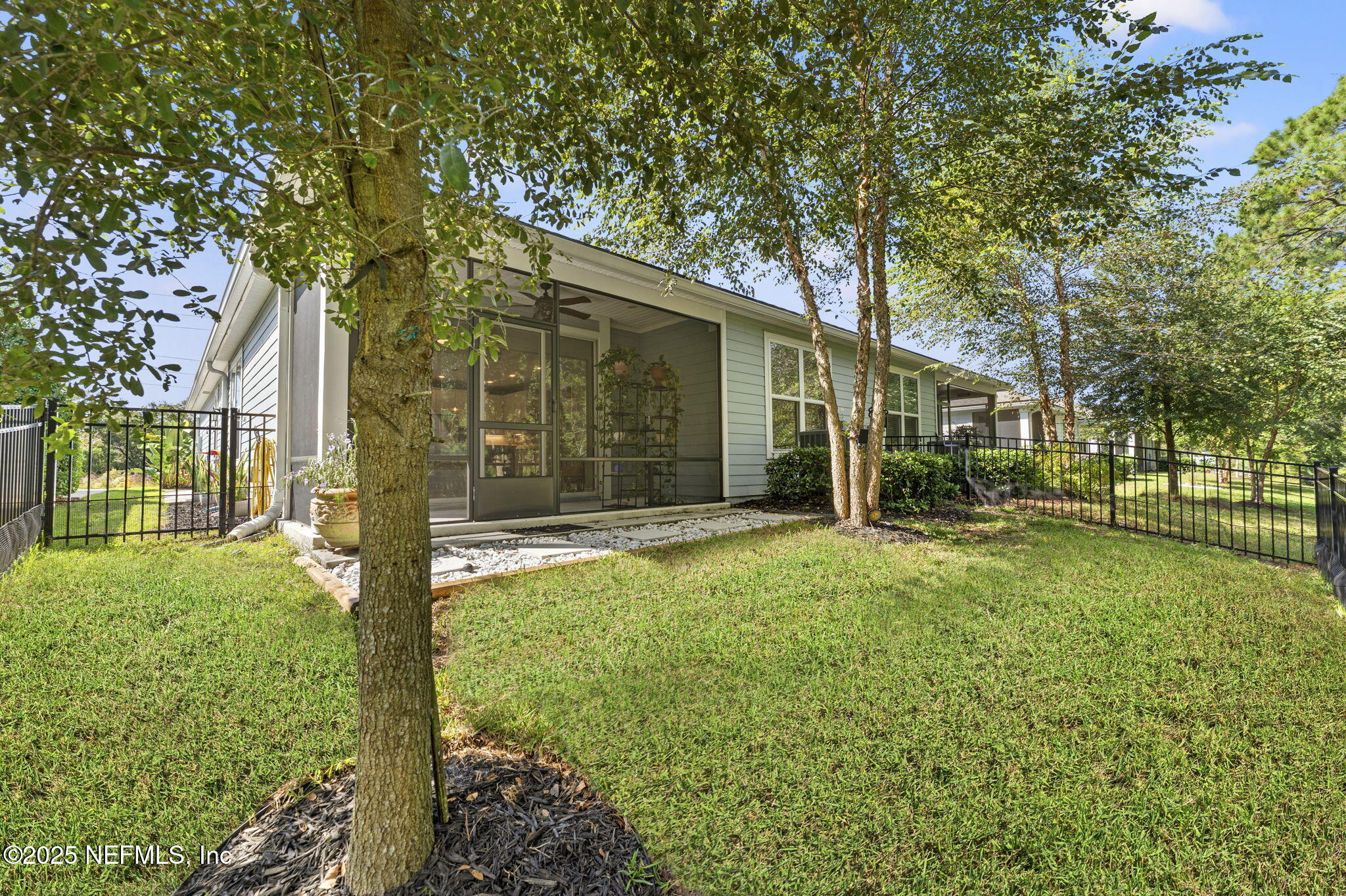 128 Modesto Drive St. Augustine, FL 32086 - Photo 27 of 30 a view of a back yard of the house