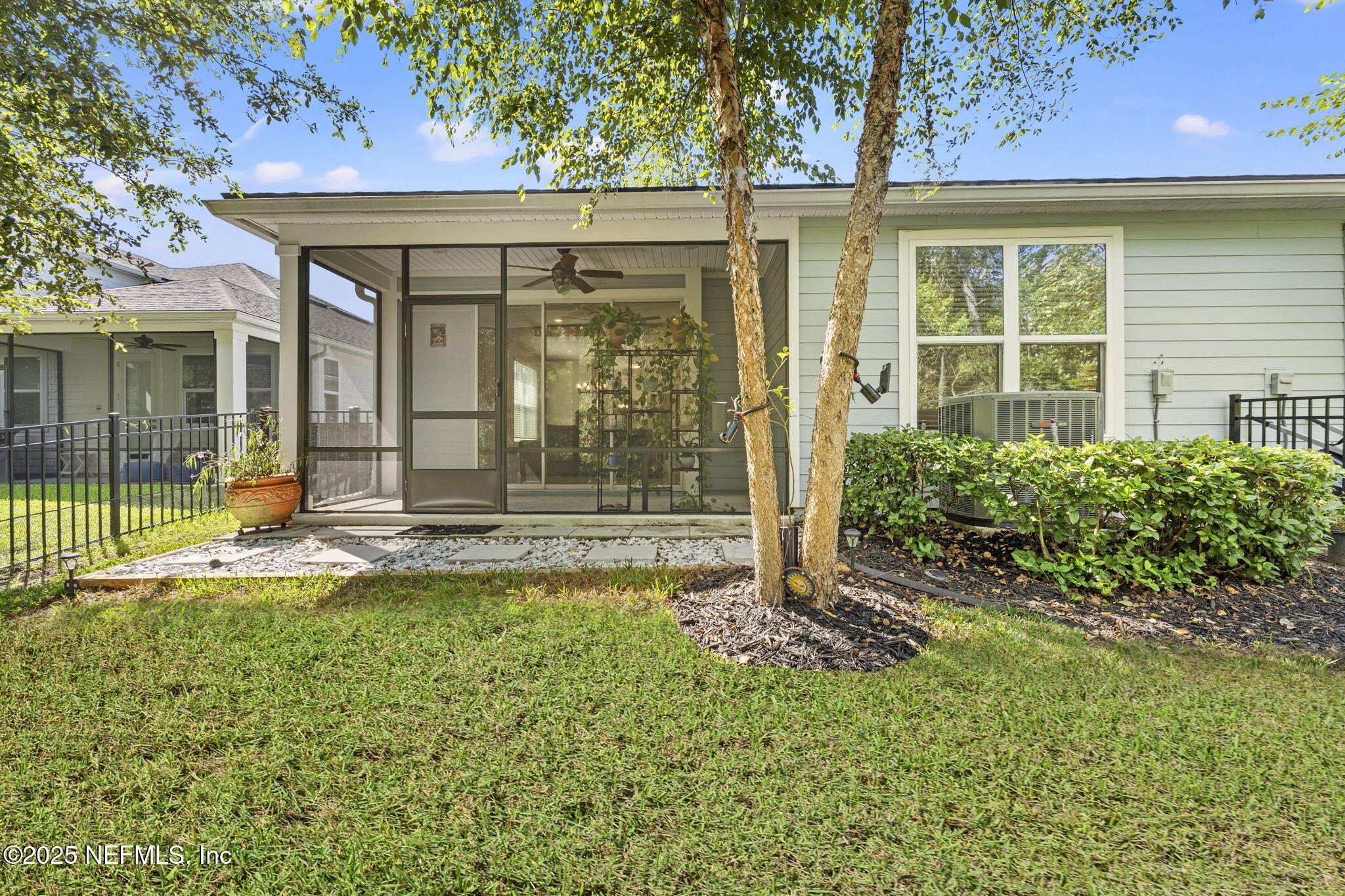 128 Modesto Drive St. Augustine, FL 32086 - Photo 28 of 30 a view of a house with backyard and porch