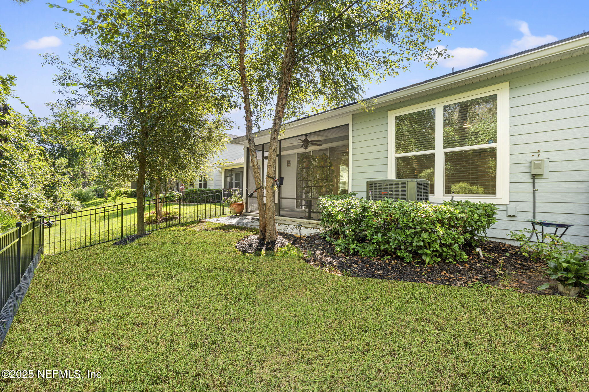 128 Modesto Drive St. Augustine, FL 32086 - Photo 29 of 30 a front view of a house with a yard