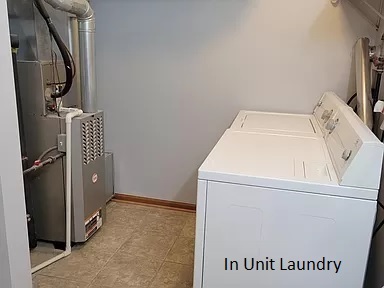1000 Bratton Avenue, Unit 4 Marseilles, IL 61341 - Photo 8 of 9 a utility room with dryer and washer