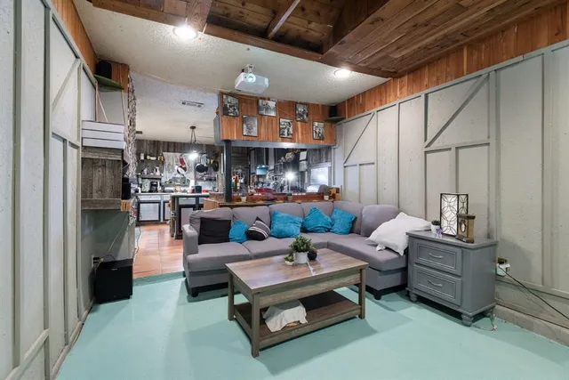 a bedroom with bed and window