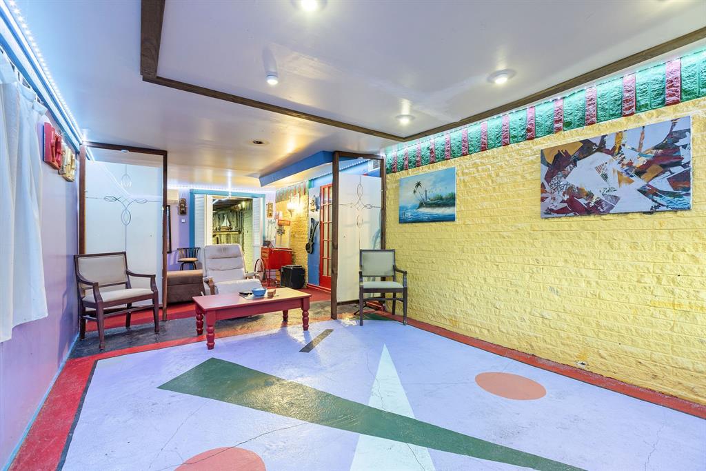 3352 Buckingham Lane Plano, TX 75074 - Photo 23 of 34 a living room with furniture pool table and a flat screen tv