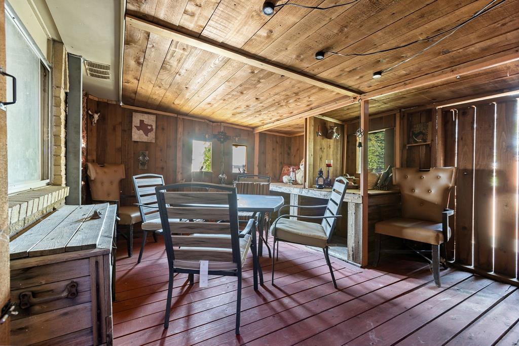 3352 Buckingham Lane Plano, TX 75074 - Photo 29 of 34 a view of a chairs and a table in a patio