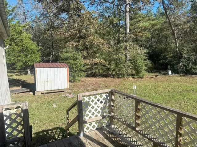 a view of a two chairs and table in the balcony