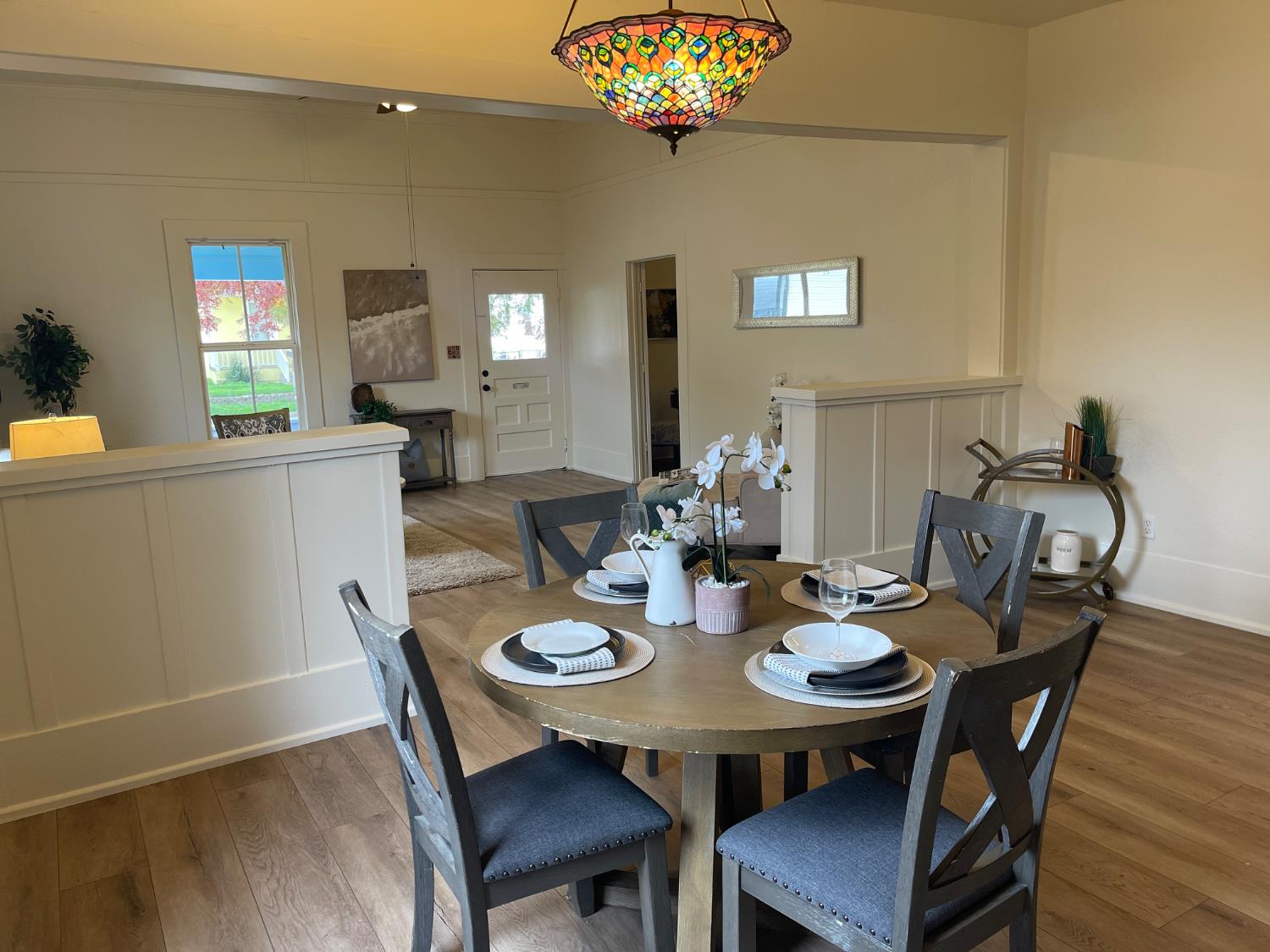 85 West 8th Street Tracy, CA 95376 - Photo 12 of 27 a view of a dining room with furniture and wooden floor