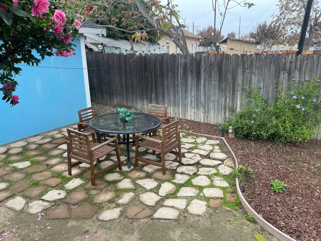 a garden with wooden fence