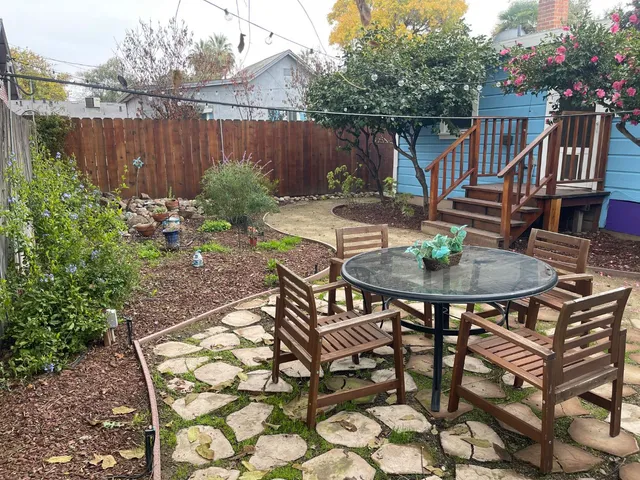 a view of a backyard with a garden