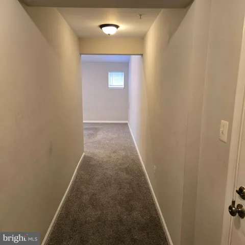 a view of hallway with window