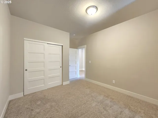 an empty room with closet