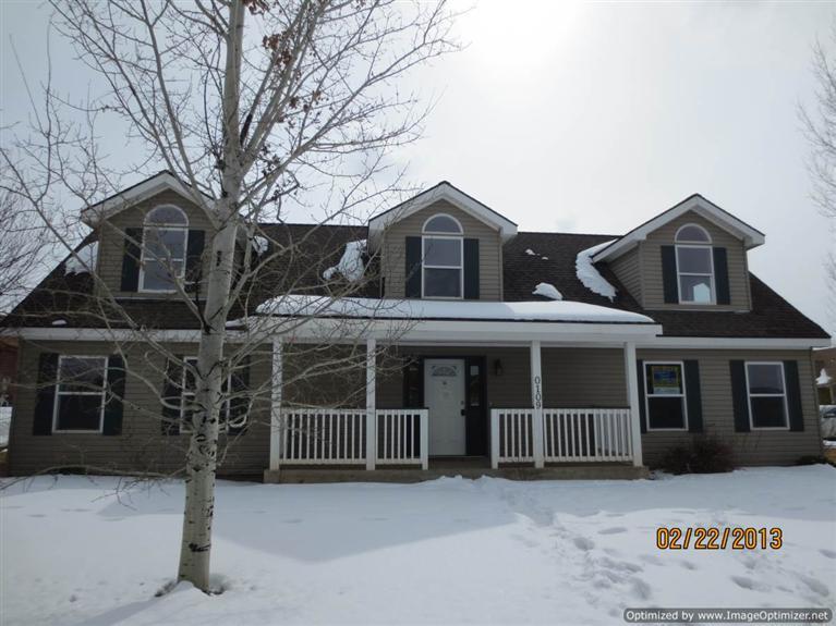 a front view of a house with windows