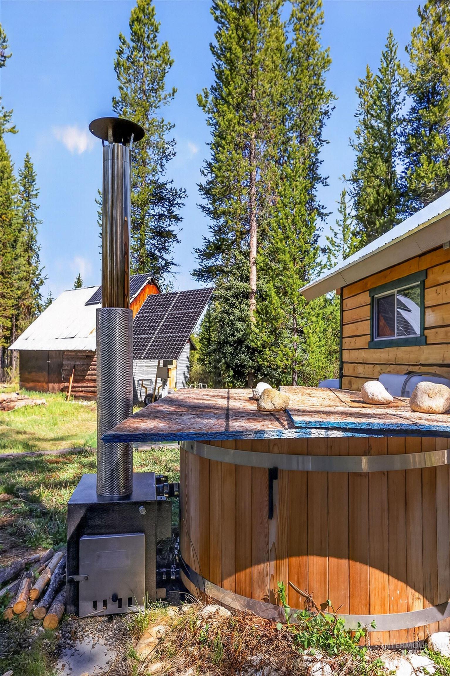 321 Secesh River Road McCall, ID 83638 - Photo 34 of 50 Wood-fired hot tub with stainless steel chimney and a natural wood exterior