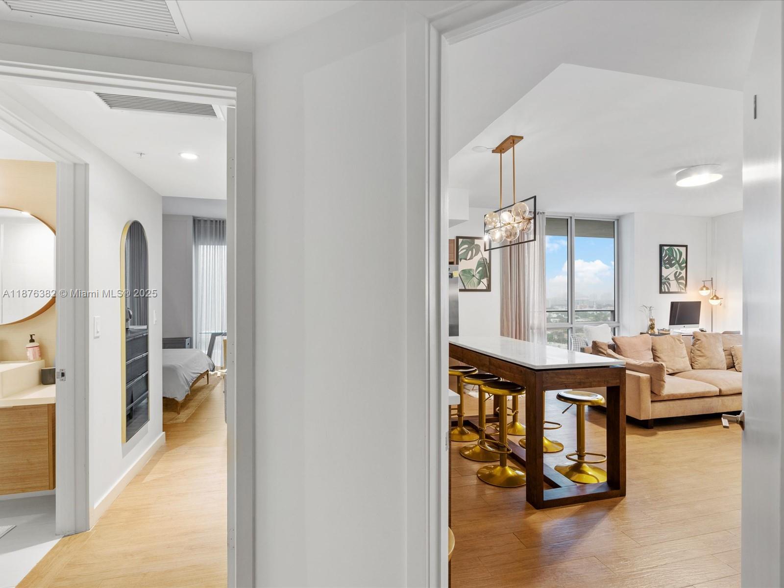 1010 Southwest 2nd Avenue, Unit 1908 Miami, FL 33130 - Photo 21 of 49 a living room with furniture and a table