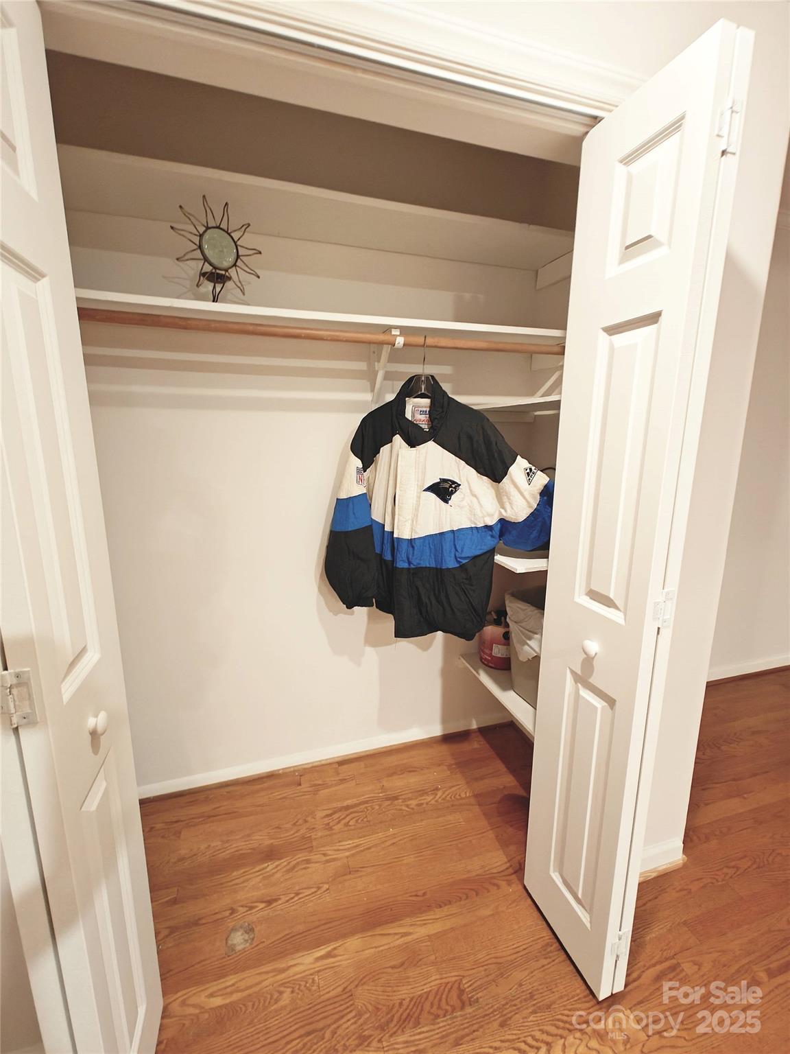 1323 Queens Road, Unit 321 Charlotte, NC 28207 - Photo 10 of 30 a hallway with a wooden floor