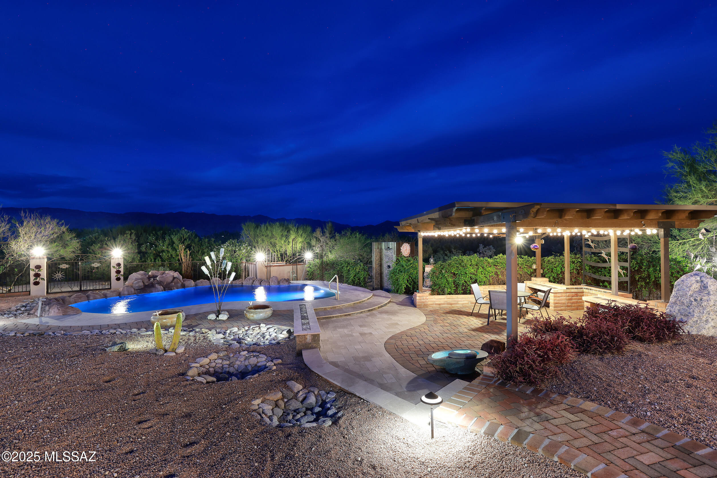 925 North Rancho Del Jefe Loop Tucson, AZ 85748 - Photo 9 of 52 a view of a patio with swimming pool table and chairs