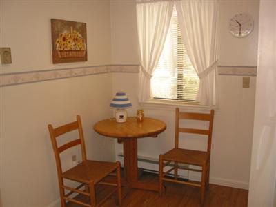 Undisclosed Address Brewster, MA 02631 - Photo 6 of 10 a view of a room with furniture and window