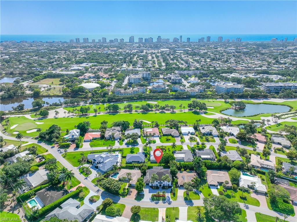 55 Burning Tree Drive Naples, FL 34105 - Photo 2 of 45 a view of a city