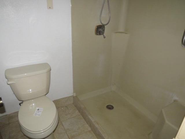 18750 Hilltop Road Penn Valley, CA 95946 - Photo 14 of 21 a bathroom with a toilet and a shower