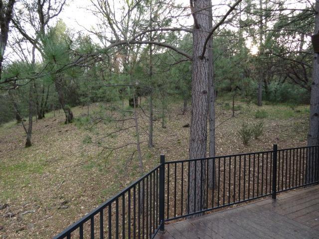 18750 Hilltop Road Penn Valley, CA 95946 - Photo 20 of 21 a balcony with wooden fence