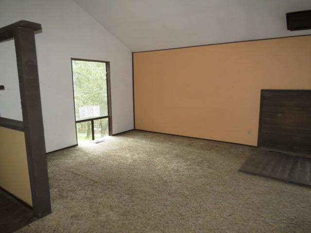 18750 Hilltop Road Penn Valley, CA 95946 - Photo 3 of 21 a view of an empty room with a window