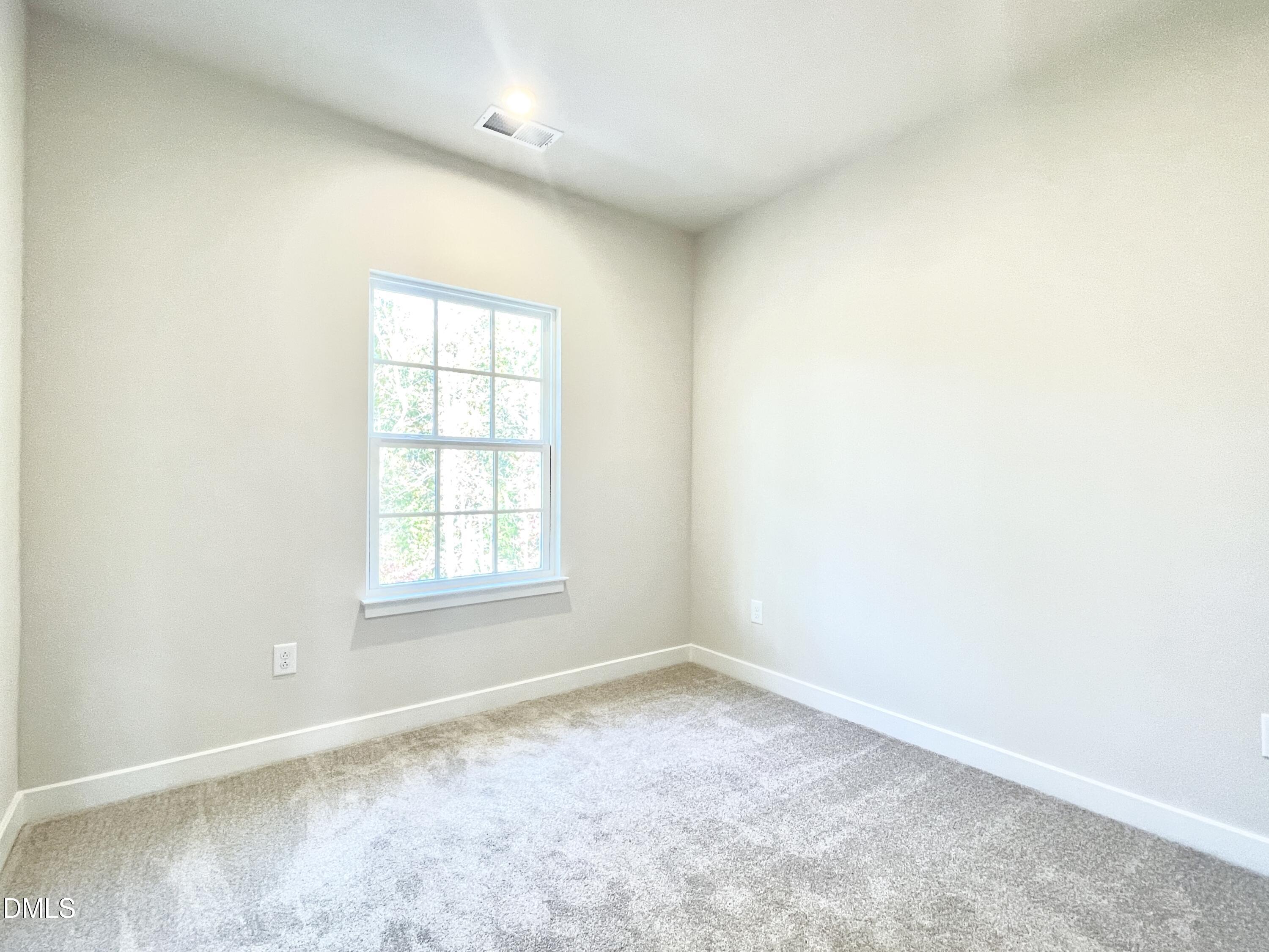2305 Pitchfork Lane Durham, NC 27713 - Photo 15 of 27 an empty room with a window