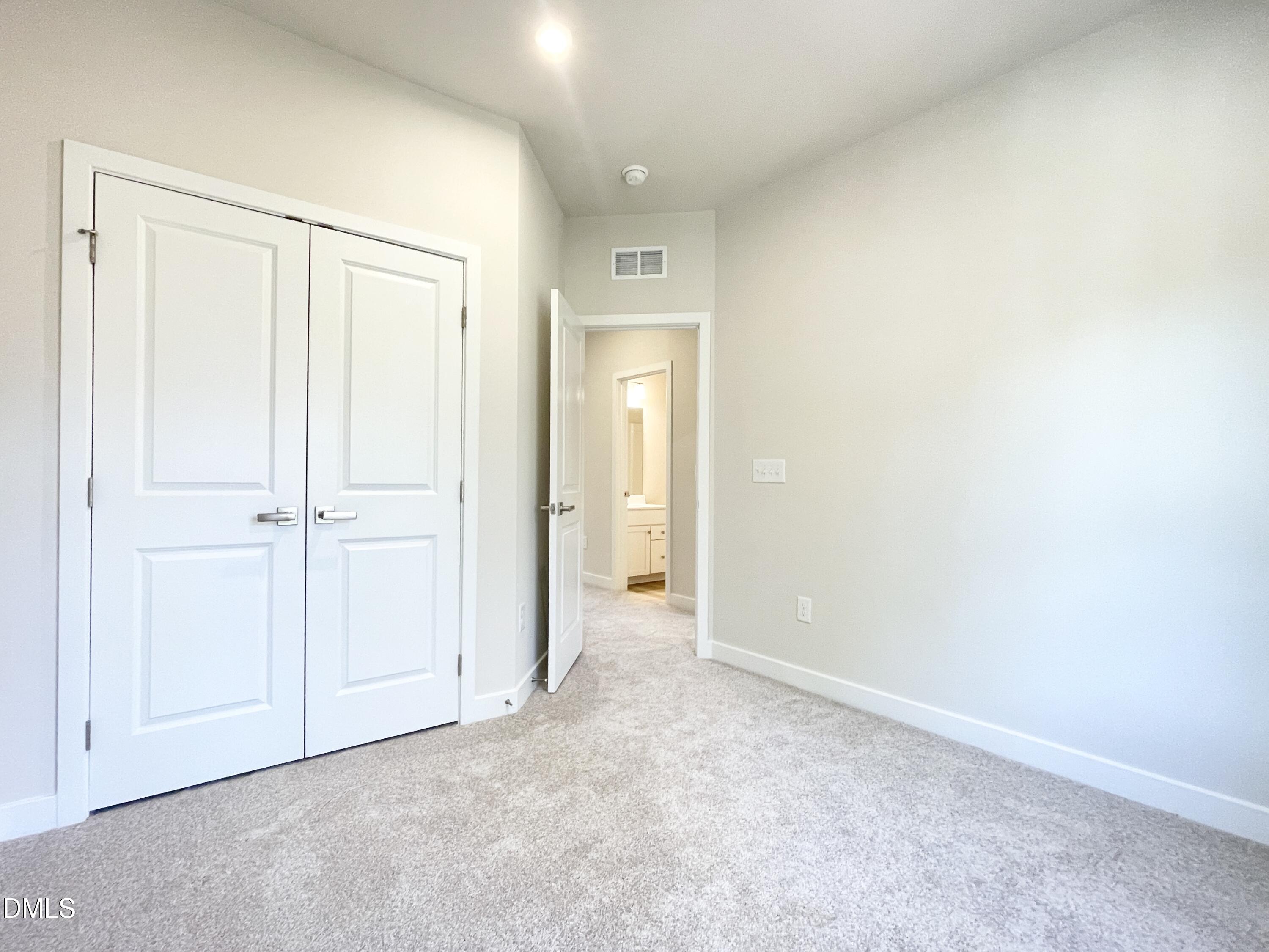 2305 Pitchfork Lane Durham, NC 27713 - Photo 16 of 27 an empty room with closet area
