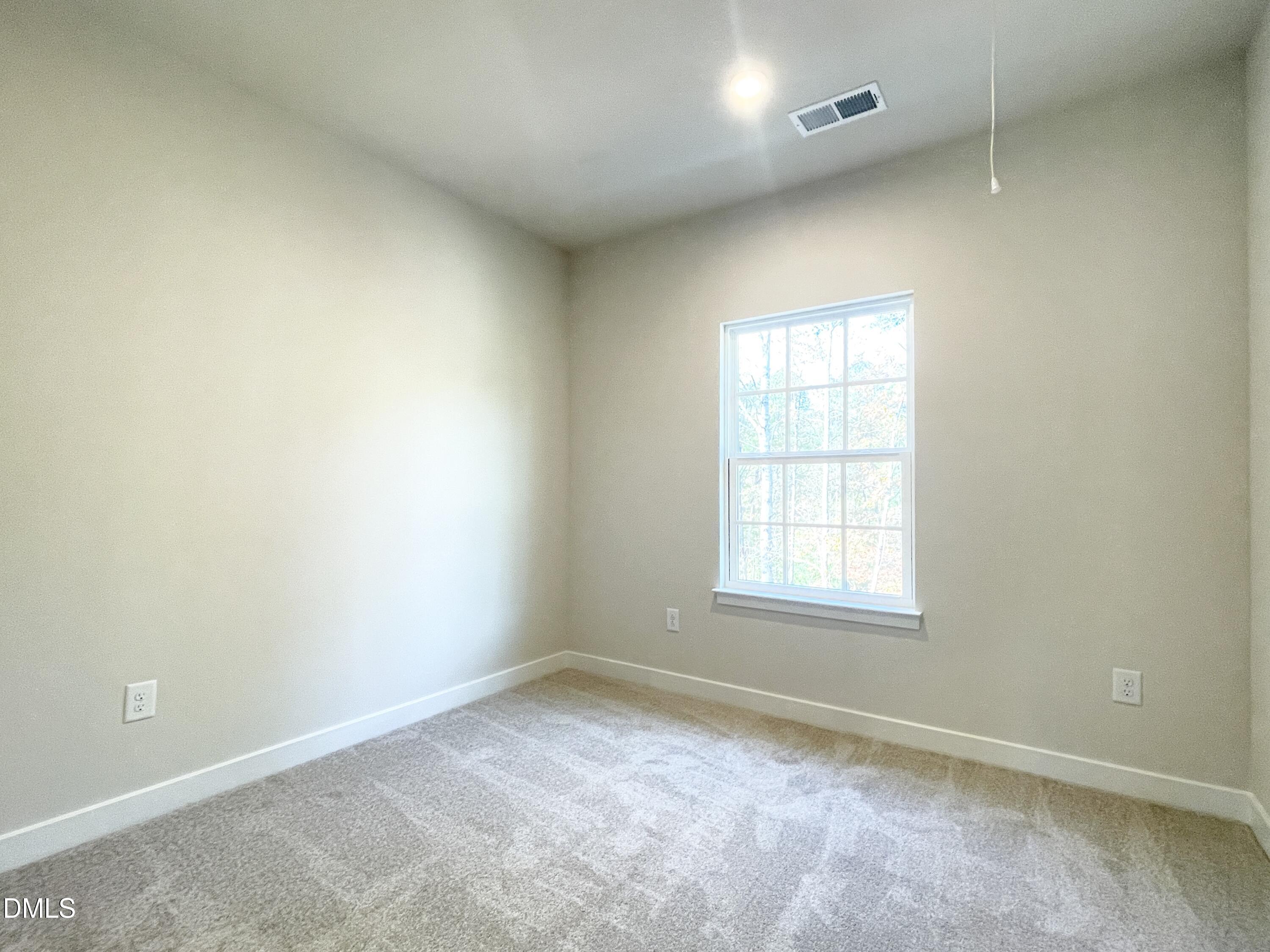 2305 Pitchfork Lane Durham, NC 27713 - Photo 17 of 27 an empty room with a window
